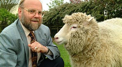 Photo of Professor Sir Ian Wilmut and Dolly the Sheep