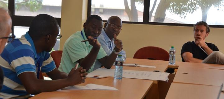 Attendees in discussions at the workshop