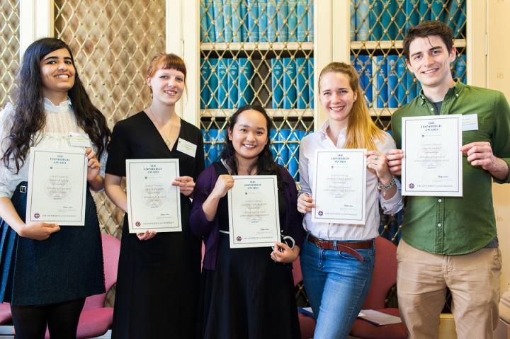 A few students with their certificates of completion in 2017.
