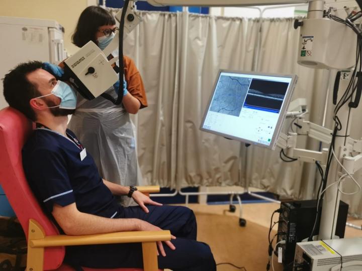 Members of the study team using Optical Coherence Tomography (OCT).
