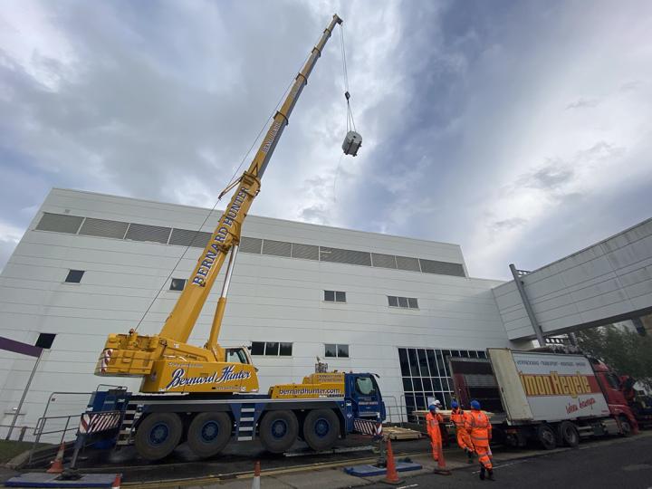 The new 9.4T magnet for the preclinical MRI facility being lifted by crane into place.