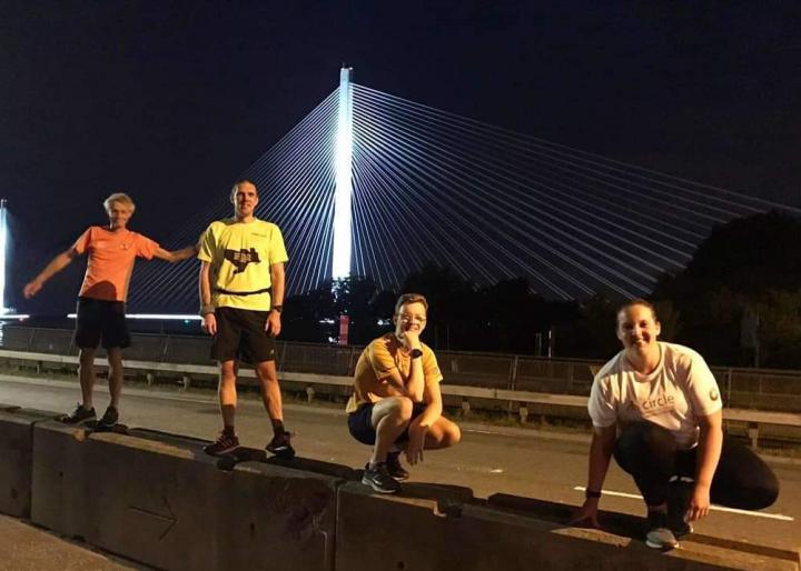 Edinburgh Imaging RIE radiographer, Isla (far right), during the DARED challenge in June - running 10k over the Forth Road Bridge at midnight.