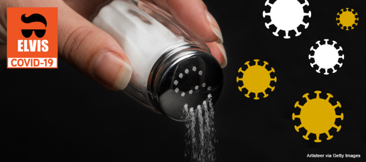 Sprinkling salt from a salt cellar with ELVIS COVID-19 logo
