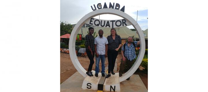 Uganda Fleming fellows and mentors on Equator