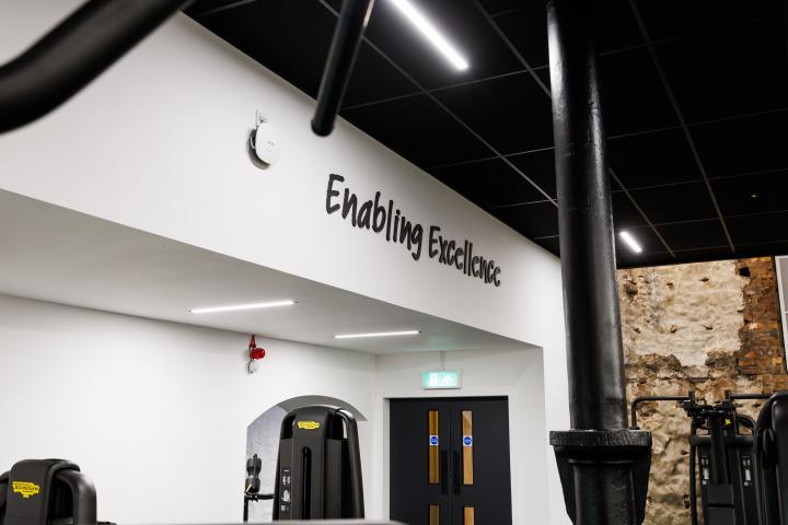Enabling Excellence wording on gym wall