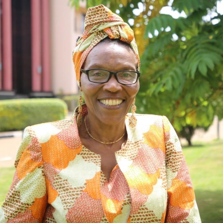 Colour head and shoulders photo of Professor Esther Mombo