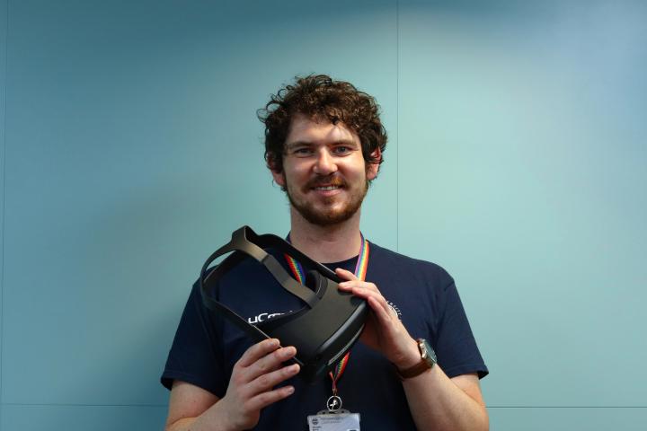 Mike Boyd Makerspace Manager holding an Oculus Quest Virtual Reality headset