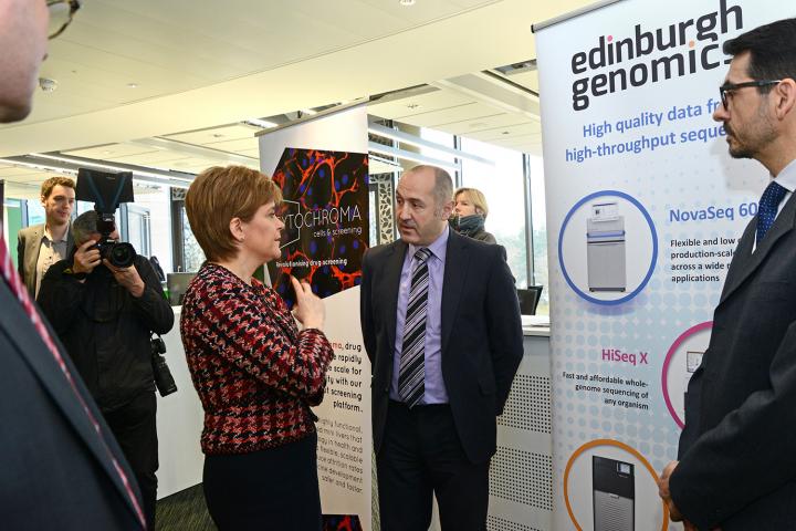 Chief Operating Officer Joel Fearnley and Roslin scientist Dr Javier Santoyo Lopez introducing Edinburgh Genomics to the First Minister. 