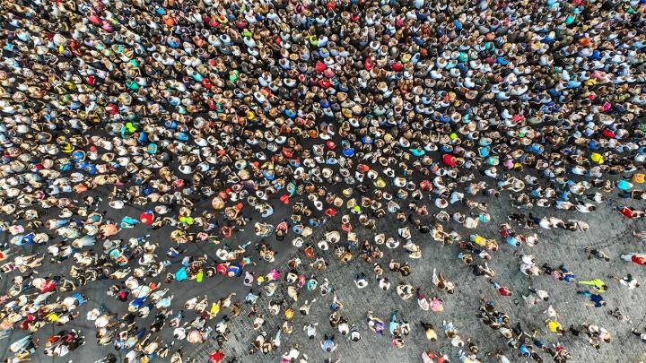 Overhead image of a large crowd of people.