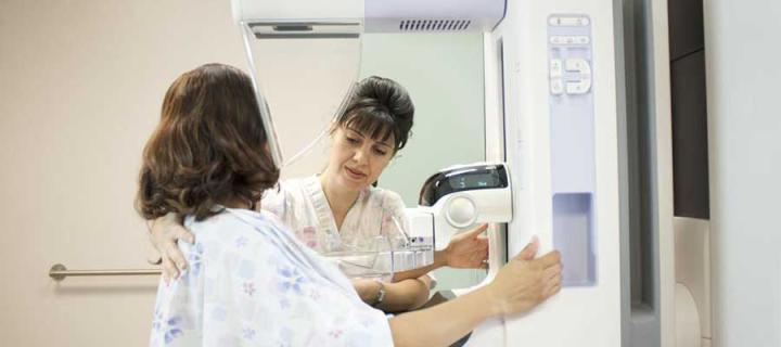 Woman having breast cancer examination