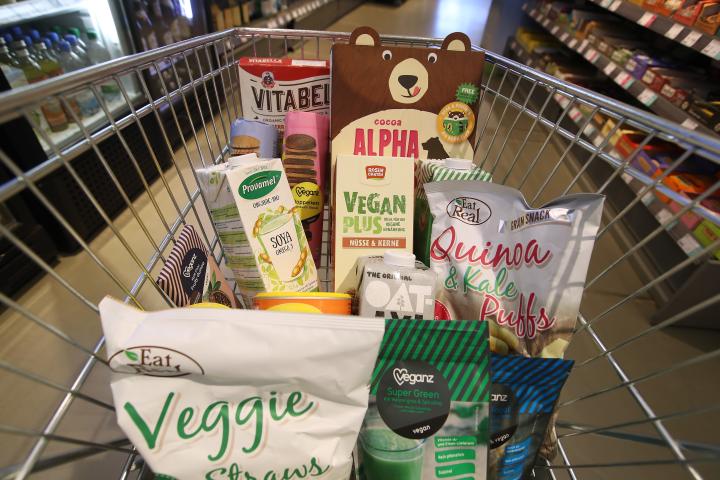 Shopping trolley full of vegan and vegetarian food