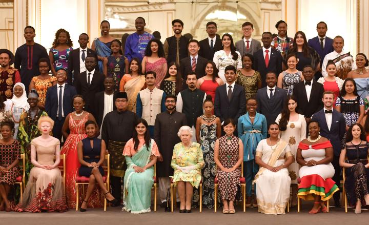 The Queen and dozens of young leaders from The Commonwealth pose for group photo 