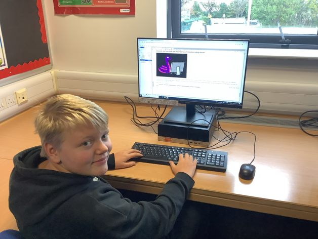 School Pupil using PC for data science