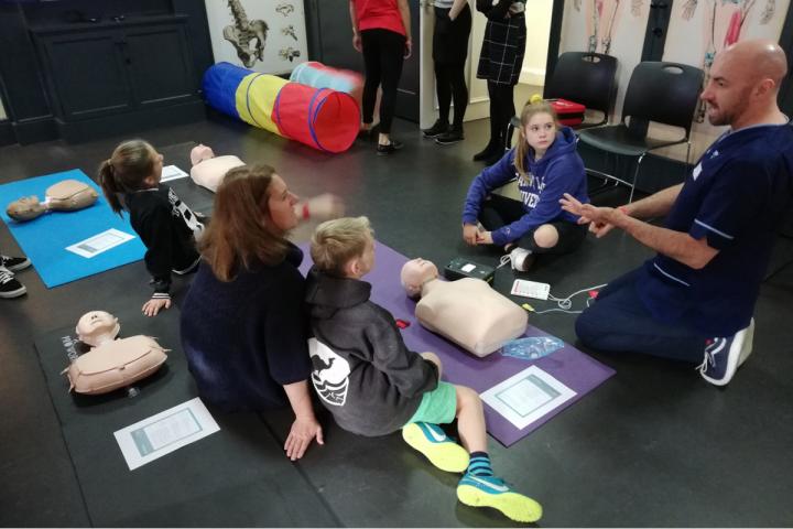 year 3 &4 Dental Institute students demonstrate CPR to children