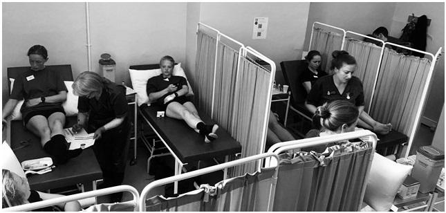 Image of FEAT patients sitting on examining tables