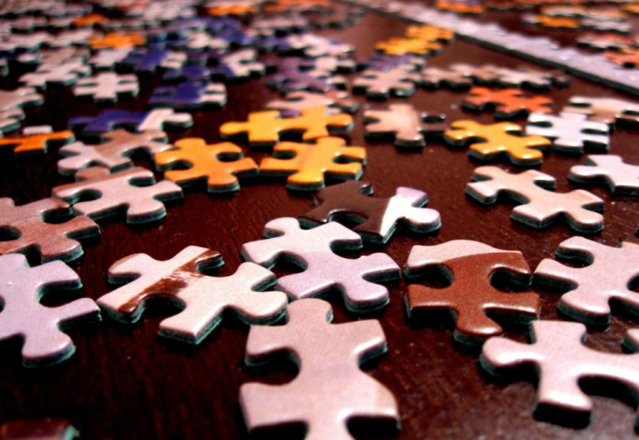 Jigsaw Pieces scattered on a table