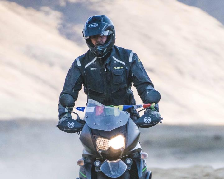 Matthew Lee motorbiking near the Tibet border