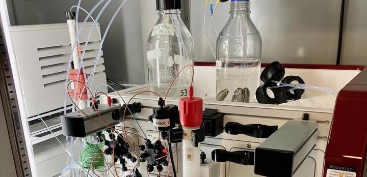 Lab equipment, bottles, wires, tubes, for creating proteins
