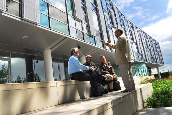 People conversing outside of the Roslin Institute building