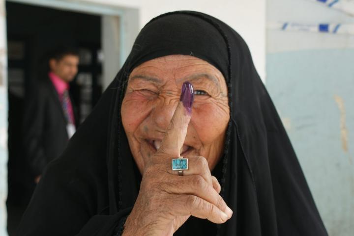 Iraqi woman voting in 2010