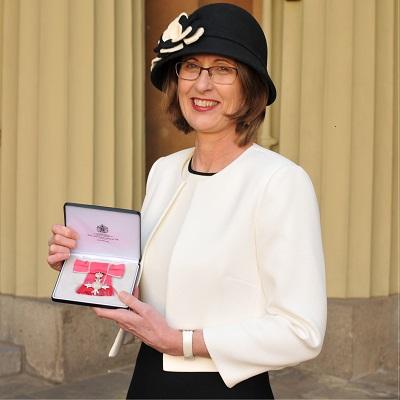 Dr Jane Haley receiving her MBE at Buckingham Palace