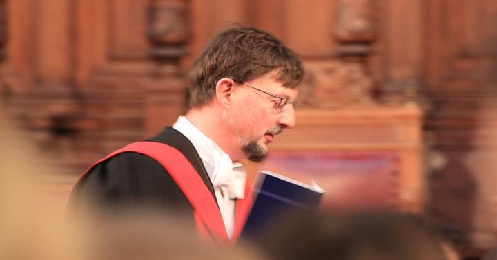 Professor John Starr graduating with his PhD from the School of Divinity