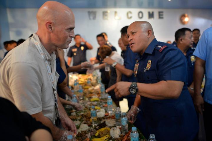 Andrew Marshall interviewing Philippine police chief Ronald dela Rosa. 