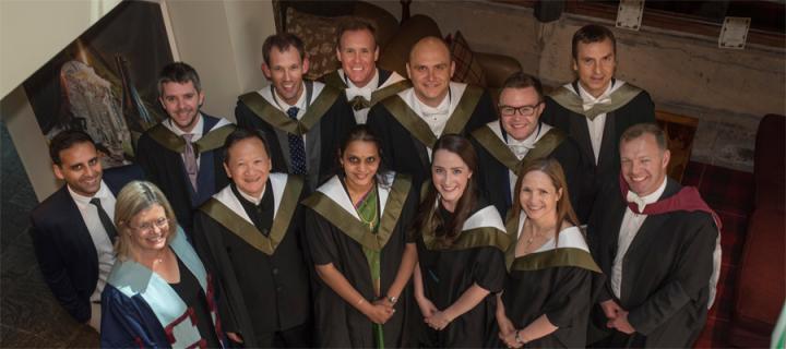 MSc Primary Dental Care students pose in their graduation robes