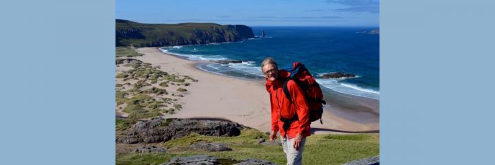 Nick Crane walking on the coast