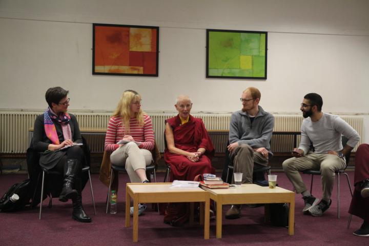 Photograph from Coexist panel discussion - students and our Honorary Buddhist Chaplain sitting together talking in Chaplaincy Centre.