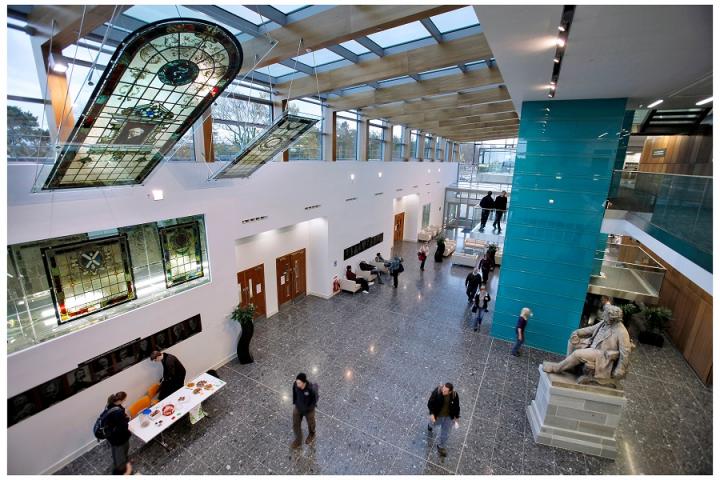 Lobby of William Dick Building with staff and students