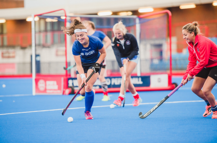 Women playing hockey at Peffermill sports centre