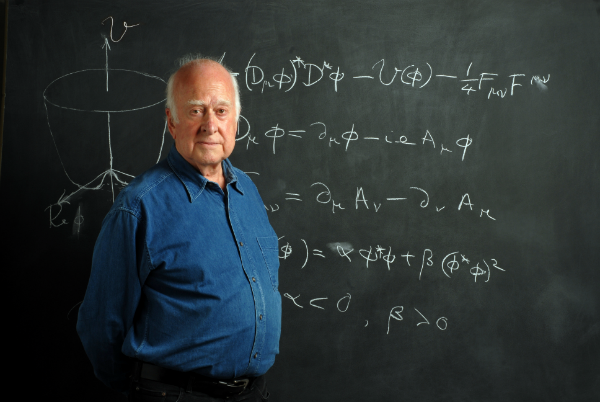 Professor Emeritus Peter Higgs with the Higgs Boson equation.