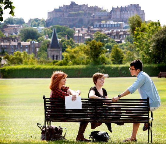 postgraduate students on bench in Edinburgh