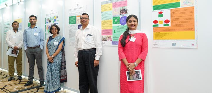 RESPIRE team members by posters at ASM 2019
