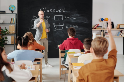 man teaching in classroom