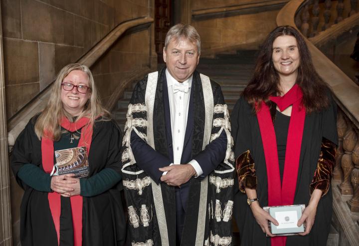 Colour image of Dr Emma Wild-Wood and Dr Sara Parvis receiving their 2021 Principals Medal with Professor Peter Mathieson