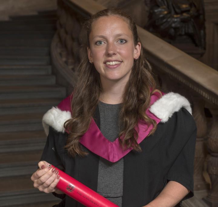 Current student Izzie Dighero accepting a degree on behalf of the Edinburgh Seven.