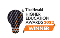 a picture of a lightbulb with the words "the herald higher education awards 2022 winner" written next to it