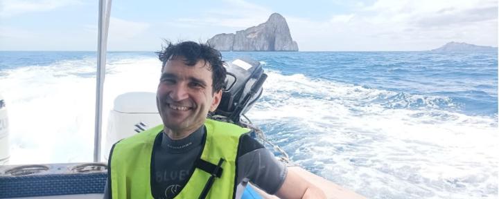 Dimitri Mignard on a boat off the Galapagos Islands