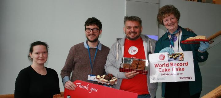 Bake-off star Glen Cosby and the organisers of the QMRI bake sale