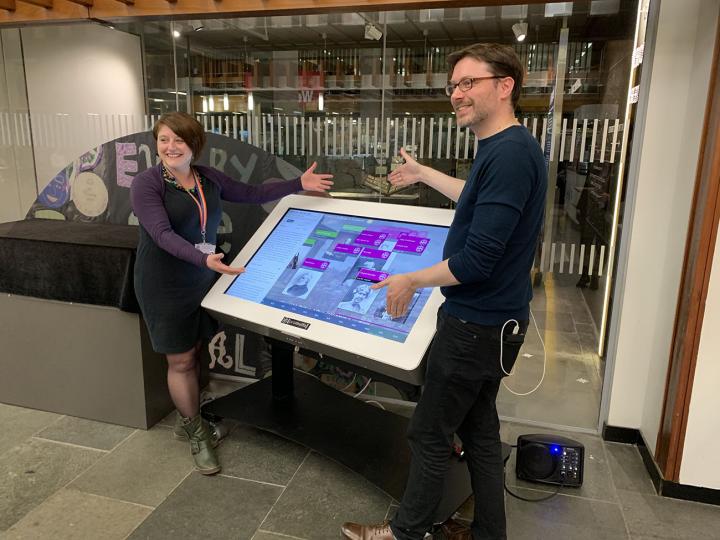 Large touchscreen panel featuring Vote 100 Histropedia timeline. Rachel Hosker (L) and Ewan McAndrew (R).