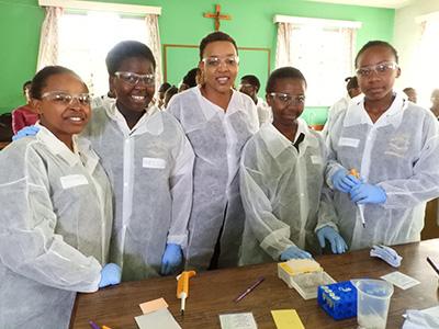High school girls conducted the Rabies Lab experiment.