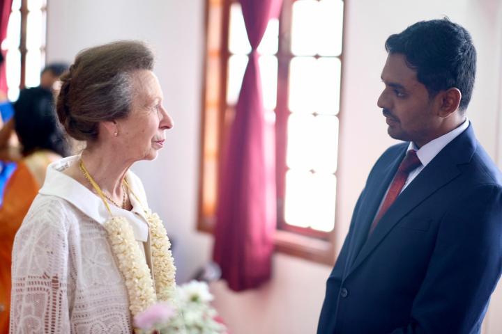 Photograph of MPH student Rishi Rasalingam meeting The Princess Royal