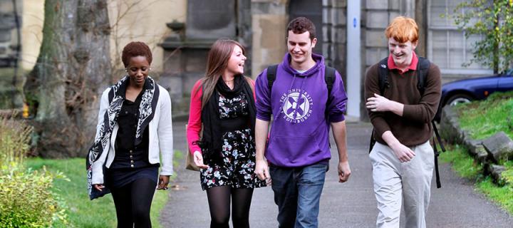 Students chatting in Greyfriars Kirkyard in Edinburgh's Old Town
