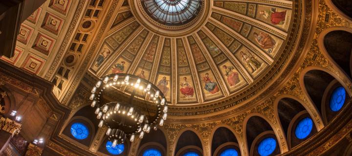 A view of the ornate McEwan Hall ceiling