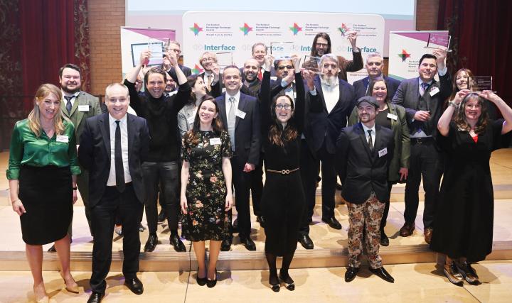 Winners gather on stage at the Scottish Knowledge Exchange Awards 2024
