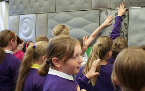 Primary school pupils taking part in a concrete workshop