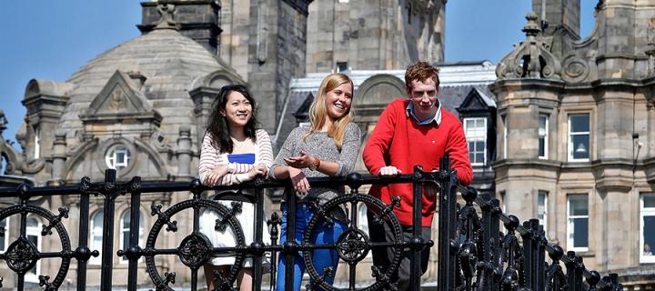 Photo of students in front of the Balmoral Hotel in the city centre