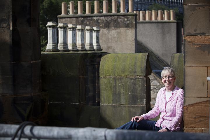 Susan Leven sat on the roof of New College